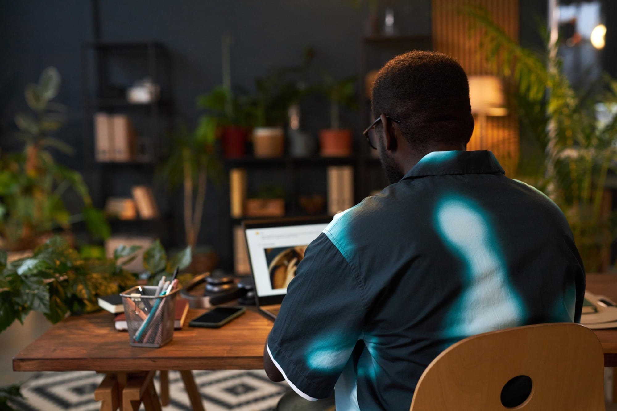 Person working on website support in office setting